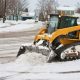 skidsteer snow clearing (background / accent image)