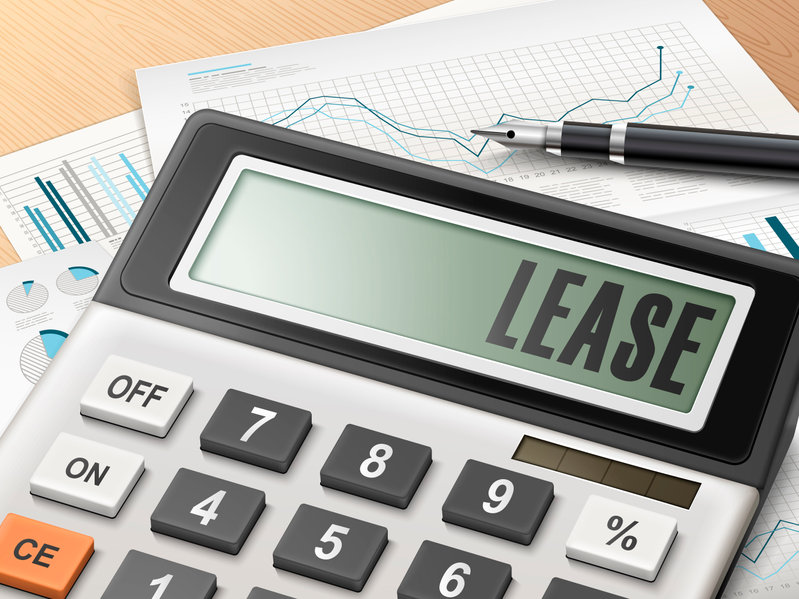 calculator with the word lease